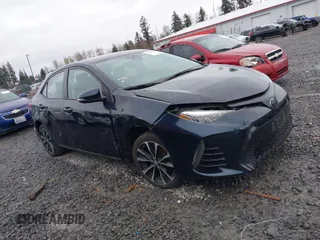 2017 Toyota Corolla L z VIN 2T1BURHE2HC763642, wystawiony jako IAAI lot #41885299 z przebiegiem 168 725 mil mil oraz . Historia ofert i sprzedaży dostępna na DreamBid. Obrazek 1.