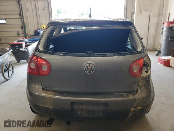2009 Volkswagen Rabbit S with VIN WVWAB71K29W124868, listed as a Copart auction lot 62224655 with 142,262 mi miles and Salvage title. Bid and sale history available at DreamBid. Image 6.
