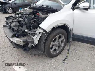 2019 Honda CR-V EX-L with VIN 2HKRW2H88KH670476, listed as a IAAI auction lot 42037439 with 36,664 mi miles and . Bid and sale history available at carsss.com. Image 20.