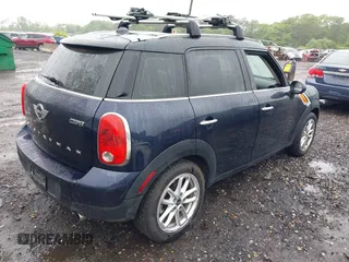 2015 MINI Countryman z VIN WMWZB3C59FWR43890, wystawiony jako IAAI lot #42372407 z przebiegiem 131 884 mil mil oraz . Historia ofert i sprzedaży dostępna na DreamBid. Obrazek 4.