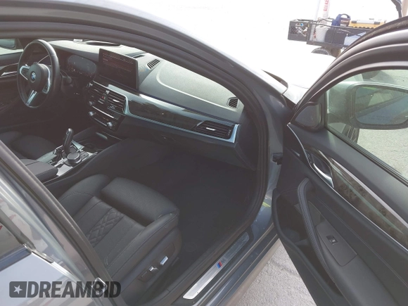 2023 BMW 5 Series 530i xDrive with VIN WBA13BJ04PCL98504, listed as a IAAI auction lot 41702411 with 27,830 mi miles and . Bid and sale history available at DreamBid. Image 5.