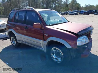 2000 Suzuki Grand Vitara with VIN JS3TE62V5Y4102944, listed as a IAAI auction lot 41782009 with 179,765 mi miles. Bid and sale history available at carsss.com. Image 1.