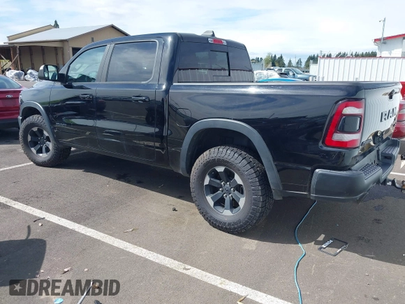 2019 Ram 1500 Rebel with VIN 1C6SRFLT2KN592652, listed as a IAAI auction lot 41989054 with 71,630 mi miles and . Bid and sale history available at DreamBid. Image 3.
