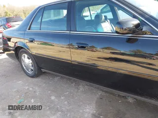 2005 Cadillac DeVille z VIN 1G6KD54Y55U196790, wystawiony jako IAAI lot #41721327 z przebiegiem 85 635 mil mil oraz . Historia ofert i sprzedaży dostępna na DreamBid. Obrazek 6.