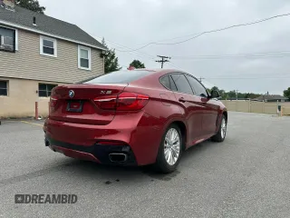 2015 BMW X6 xDrive50i with VIN 5UXKU6C59F0F93634, listed as a Copart auction lot 68158794 with 109,923 mi miles and Clean Title. Bid and sale history available at carsss.com. Image 3.