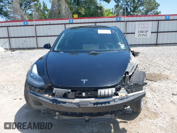 2018 Tesla Model 3 Long Range Battery with VIN 5YJ3E1EAXJF019907, listed as a IAAI auction lot 41995969 with Not Provided miles and . Bid and sale history available at DreamBid. Image 13.
