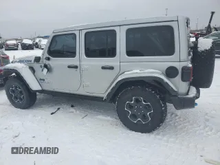 2022 Jeep Wrangler Unlimited Rubicon with VIN 1C4JJXR63NW264609, listed as a Copart auction lot 88148715 with 33,308 mi miles and Salvage title. Bid and sale history available at DreamBid. Image 2.
