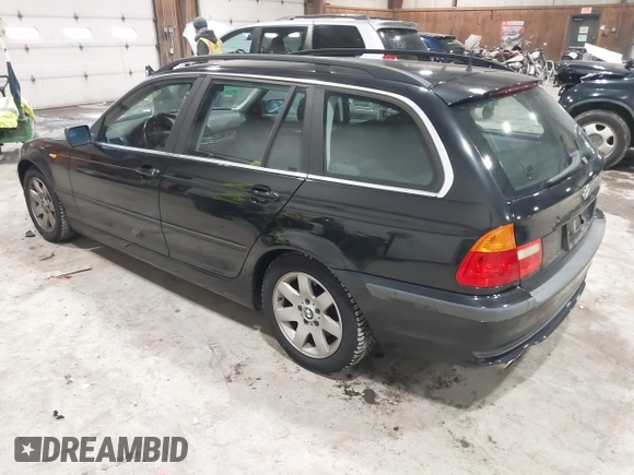 2004 BMW 3 Series 325xi with VIN WBAEP33464PF04602, listed as a IAAI auction lot 41634556 with 92,408 mi miles. Bid and sale history available at carsss.com. Image 3.