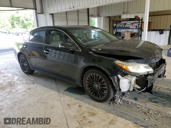 2016 Toyota Avalon Limited with VIN 4T1BK1EB9GU216124, listed as a Copart auction lot 54565495 with 192,136 mi miles and Salvage Title. Bid and sale history available at DreamBid. Image 4.