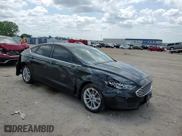 2020 Ford Fusion SE z VIN 3FA6P0LUXLR254247, wystawiony jako Copart lot #60658095 z przebiegiem 76 413 mil mil oraz Szkoda całkowita • Salvage title. Historia ofert i sprzedaży dostępna na DreamBid. Obrazek 14.