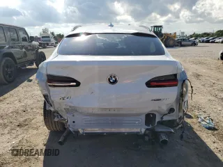 2021 BMW X4 xDrive30i with VIN 5UX2V1C0XM9E11002, listed as a Copart auction lot 67348653 with 27,805 mi miles. Bid and sale history available at carsss.com. Image 6.