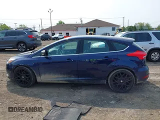 2016 Ford Focus Titanium with VIN 1FADP3N26GL206866, listed as a IAAI auction lot 42403015 with 95,753 mi miles and . Bid and sale history available at DreamBid. Image 14.