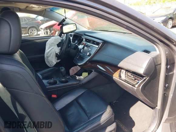 2013 Toyota Avalon XLE with VIN 4T1BK1EB2DU005939, listed as a IAAI auction lot 42172970 with 248,580 mi miles and . Bid and sale history available at DreamBid. Image 5.
