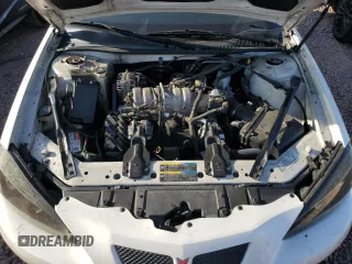 2007 Pontiac Grand Prix z VIN 2G2WP552971210158, wystawiony jako Copart lot #52347035 z przebiegiem 209 095 mil mil oraz Szkoda całkowita • Salvage title. Historia ofert i sprzedaży dostępna na DreamBid. Obrazek 11.