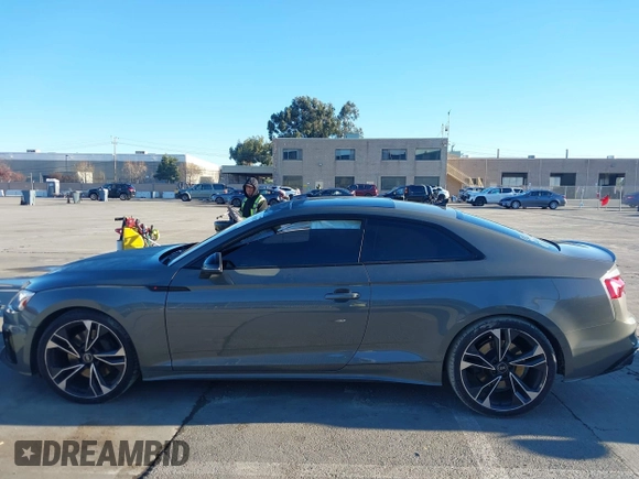 2023 Audi S5 Premium Plus with VIN WAUP4AF58PA001748, listed as a IAAI auction lot 41194878 with 33,877 mi miles and . Bid and sale history available at DreamBid. Image 14.