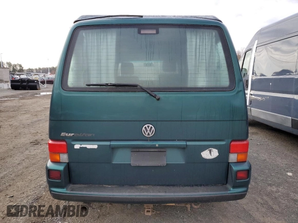 2002 Volkswagen EuroVan MV с VIN WV2NB47092H095600, выставлен на аукционе Copart как лот 50705065 с пробегом 223 049 миль миль и Чистый • Clean title. История ставок и продаж доступна на DreamBid. Изображение 6.