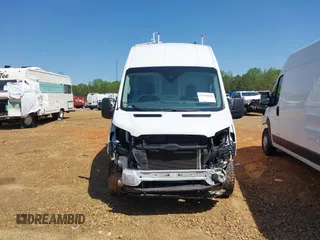 2021 Ford Transit Cargo z VIN 1FTBW3X88MKA42155, wystawiony jako IAAI lot #41988889 z przebiegiem 74 643 mil mil oraz . Historia ofert i sprzedaży dostępna na DreamBid. Obrazek 13.