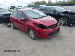 2013 Ford Fiesta SE with VIN 3FADP4EJXDM152463, listed as a IAAI auction lot 42122969 with 66,952 mi miles. Bid and sale history available at carsss.com. Image 1.