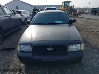 2006 Ford Police Interceptor with VIN 2FAHP71W76X142677, listed as a IAAI auction lot 41173196 with 152,236 mi miles. Bid and sale history available at carsss.com. Image 12.
