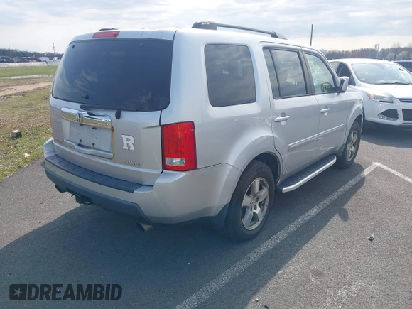 2011 Honda Pilot EX-L with VIN 5FNYF4H68BB017361, listed as a IAAI auction lot 41933024 with 338,819 mi miles and . Bid and sale history available at carsss.com. Image 2.