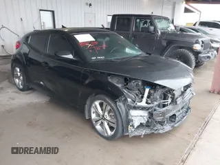 2017 Hyundai Veloster Value Edition with VIN KMHTC6AD6HU321999, listed as a IAAI auction lot 41611017 with 99,382 mi miles. Bid and sale history available at carsss.com. Image 1.