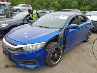 2017 Honda Civic LX with VIN 19XFC2F53HE217867, listed as a IAAI auction lot 42296194 with 104,670 mi miles and . Bid and sale history available at DreamBid. Image 2.