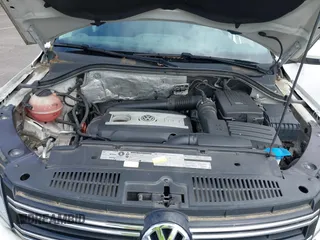 2012 Volkswagen Tiguan S z VIN WVGBV7AX8CW567505, wystawiony jako IAAI lot #42311708 z przebiegiem 127 566 mil mil oraz . Historia ofert i sprzedaży dostępna na DreamBid. Obrazek 10.
