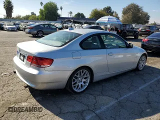 2010 BMW 3 Series 328i with VIN WBAWV1C58AP124404, listed as a Copart auction lot 80296704 with 113,597 mi miles and Clean Title. Bid and sale history available at carsss.com. Image 3.