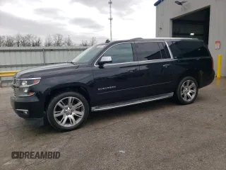 2015 Chevrolet Suburban LTZ with VIN 1GNSCKKC3FR291995, listed as a Copart auction lot 51656815 with 156,504 mi miles and Clean Title. Bid and sale history available at carsss.com. Image 1.