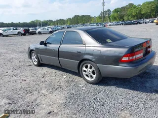 2000 Lexus ES 300 with VIN JT8BF28G2Y5089166, listed as a IAAI auction lot 42004449 with 326,305 mi miles. Bid and sale history available at carsss.com. Image 3.