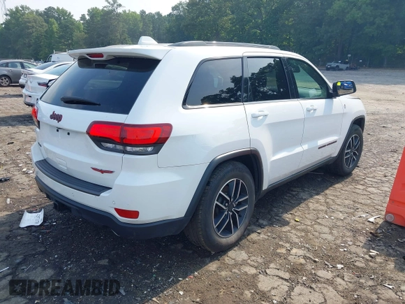 2021 Jeep Grand Cherokee Trailhawk with VIN 1C4RJFLG5MC564912, listed as a IAAI auction lot 42589787 with 25,604 mi miles and . Bid and sale history available at DreamBid. Image 4.