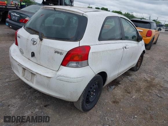 2009 Toyota Yaris with VIN JTDJT903595224746, listed as a IAAI auction lot 42217189 with 183,363 mi miles. Bid and sale history available at carsss.com. Image 4.