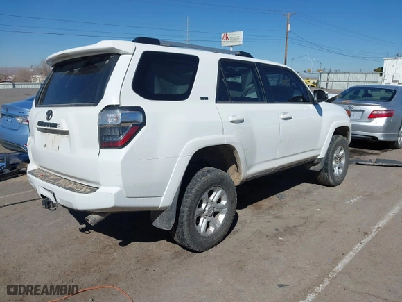2022 Toyota 4Runner SR5 Premium with VIN JTENU5JR1N5990635, listed as a IAAI auction lot 41612015 with 66,619 mi miles. Bid and sale history available at carsss.com. Image 4.