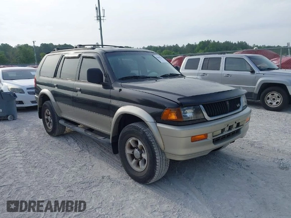 1999 Mitsubishi Montero Sport LS with VIN JA4MT31HXXP024168, listed as a IAAI auction lot 42064951 with 123,539 mi miles. Bid and sale history available at carsss.com. Image 1.