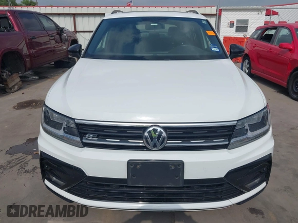 2021 Volkswagen Tiguan SE with VIN 3VV3B7AX9MM003432, listed as a IAAI auction lot 41914477 with 64,530 mi miles and . Bid and sale history available at DreamBid. Image 13.