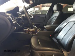 2016 Audi A7 3.0 Premium Plus with VIN WAUWGAFC5GN064672, listed as a Copart auction lot 71574044 with 64,927 mi miles and Salvage Title. Bid and sale history available at carsss.com. Image 7.