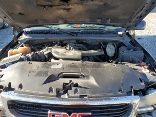 2004 GMC Yukon XL SLT with VIN 1GKEC16ZX4J107876, listed as a Copart auction lot 87132974 with 682,081 mi miles and Salvage Title. Bid and sale history available at carsss.com. Image 12.