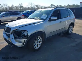 2011 BMW X5 35i with VIN 5UXZV4C5XBL412661, listed as a IAAI auction lot 41810470 with 168,470 mi miles. Bid and sale history available at carsss.com. Image 16.