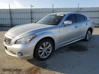 2012 Infiniti M37 with VIN JN1BY1AP9CM336121, listed as a Copart auction lot 71656374 with 125,497 mi miles and Salvage Title. Bid and sale history available at carsss.com. Image 1.