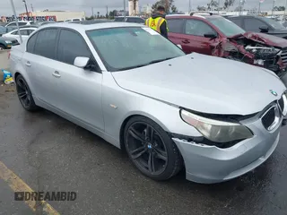 2007 BMW 5 Series 530i with VIN WBANE73507CM46579, listed as a IAAI auction lot 41511577 with 168,904 mi miles. Bid and sale history available at carsss.com. Image 1.