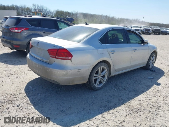 2013 Volkswagen Passat SE with VIN 1VWBN7A39DC078905, listed as a IAAI auction lot 42064537 with 185,853 mi miles and . Bid and sale history available at DreamBid. Image 4.