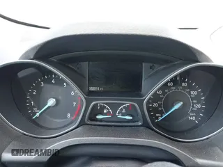 2018 Ford Escape S z VIN 1FMCU0F78JUA56974, wystawiony jako IAAI lot #42232294 z przebiegiem 63 511 mil mil oraz . Historia ofert i sprzedaży dostępna na DreamBid. Obrazek 7.