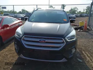 2018 Ford Escape Titanium with VIN 1FMCU9J95JUB30803, listed as a IAAI auction lot 42286536 with 63,309 mi miles and . Bid and sale history available at DreamBid. Image 13.