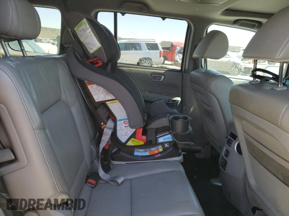 2011 Honda Pilot Touring z VIN 5FNYF3H9XBB044579, wystawiony jako Copart lot #50303125 z przebiegiem 227 482 mil mil oraz Szkoda całkowita • Salvage title. Historia ofert i sprzedaży dostępna na DreamBid. Obrazek 11.