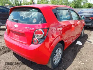2012 Chevrolet Sonic LT with VIN 1G1JC6SHXC4147031, listed as a IAAI auction lot 42343093 with 165,386 mi miles and . Bid and sale history available at DreamBid. Image 4.
