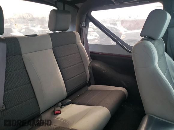 2007 Jeep Wrangler X with VIN 1J4FA24147L160102, listed as a Copart auction lot 52001105 with 219,939 mi miles and Clean Title. Bid and sale history available at carsss.com. Image 10.