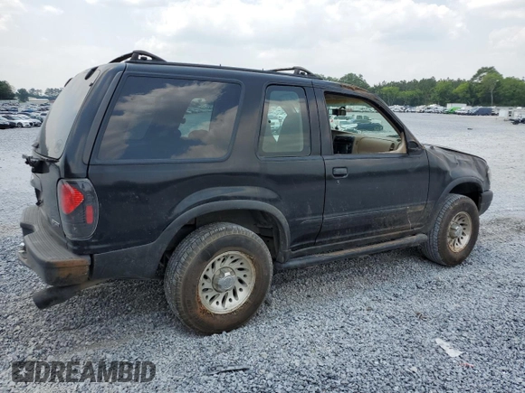 2000 Ford Explorer Sport with VIN 1FMYU60E8YUB03494, listed as a Copart auction lot 59266395 with 210,925 mi miles and Salvage title. Bid and sale history available at DreamBid. Image 3.