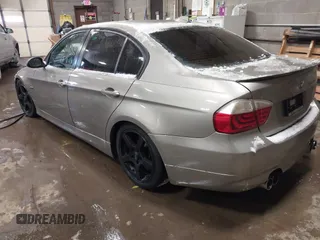 2008 BMW 3 Series 335xi with VIN WBAVD53528A253497, listed as a IAAI auction lot 41377661 with 136,677 mi miles. Bid and sale history available at carsss.com. Image 3.
