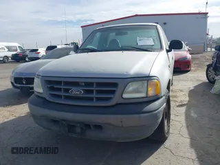 2002 Ford F-150 XL with VIN 3FTRF17212MA13777, listed as a IAAI auction lot 40977321 with 1 mi miles. Bid and sale history available at carsss.com. Image 12.
