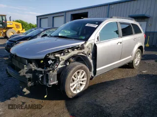 2017 Dodge Journey SXT with VIN 3C4PDDBG7HT525091, listed as a Copart auction lot 60022385 with 141,964 mi miles and Salvage title. Bid and sale history available at DreamBid. Image 1.